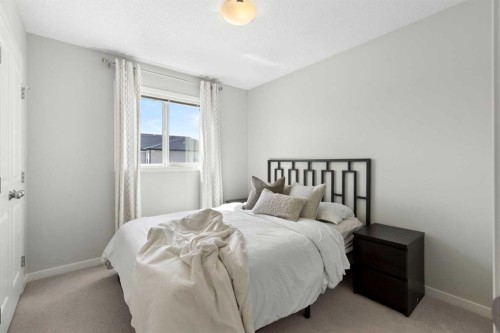 88 Copperpond Park Se, Calgary, AB - Indoor Photo Showing Bedroom