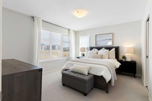 88 Copperpond Park Se, Calgary, AB - Indoor Photo Showing Bedroom