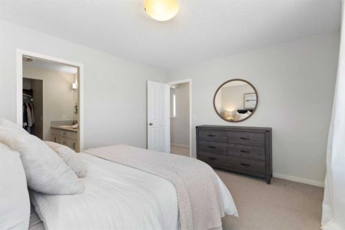 88 Copperpond Park Se, Calgary, AB - Indoor Photo Showing Bedroom
