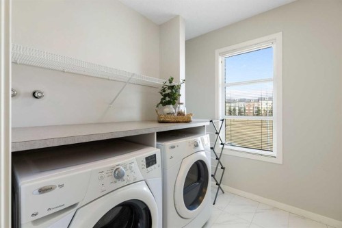 88 Copperpond Park Se, Calgary, AB - Indoor Photo Showing Laundry Room