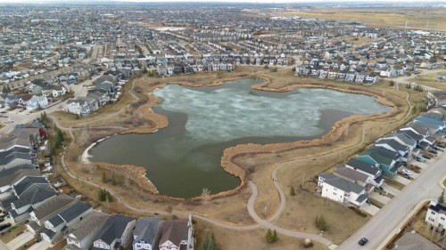 88 Copperpond Park Se, Calgary, AB - Outdoor With Body Of Water With View