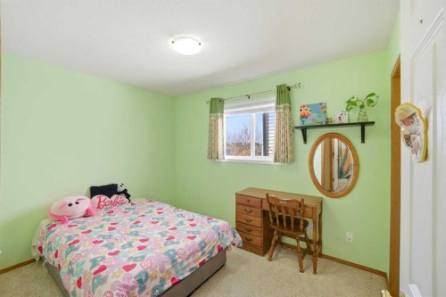 39 Saddlemont Close Ne, Calgary, AB - Indoor Photo Showing Bedroom