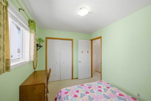 39 Saddlemont Close Ne, Calgary, AB - Indoor Photo Showing Bedroom