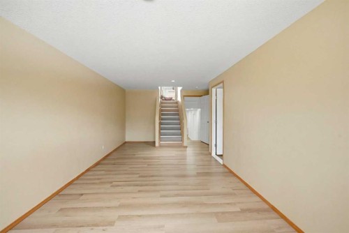 39 Saddlemont Close Ne, Calgary, AB - Indoor Photo Showing Other Room