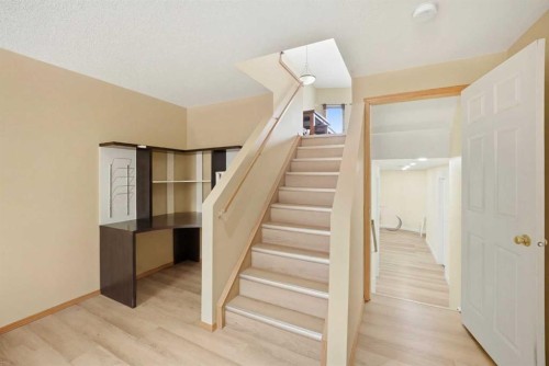 39 Saddlemont Close Ne, Calgary, AB - Indoor Photo Showing Other Room
