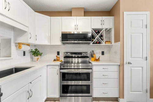 53 Copperfield Court Se, Calgary, AB - Indoor Photo Showing Kitchen