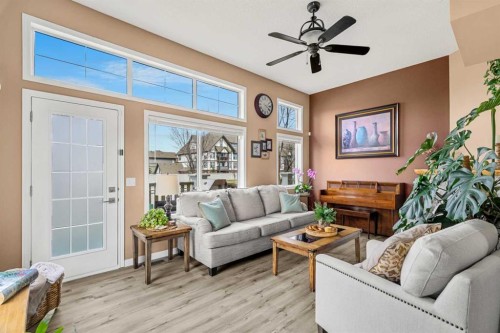 53 Copperfield Court Se, Calgary, AB - Indoor Photo Showing Living Room With Fireplace