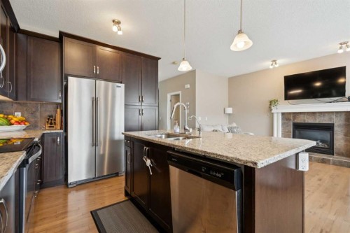 22 Nolanfield Heights Nw, Calgary, AB - Indoor Photo Showing Kitchen With Stainless Steel Kitchen With Double Sink With Upgraded Kitchen