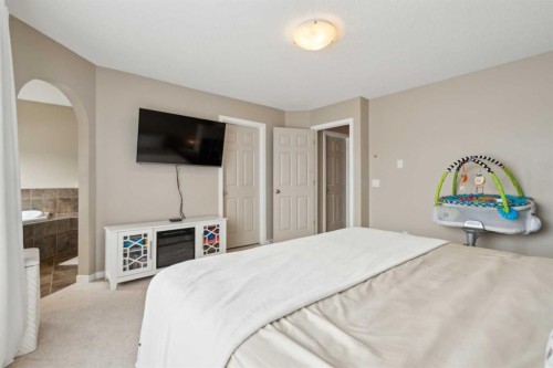 22 Nolanfield Heights Nw, Calgary, AB - Indoor Photo Showing Bedroom