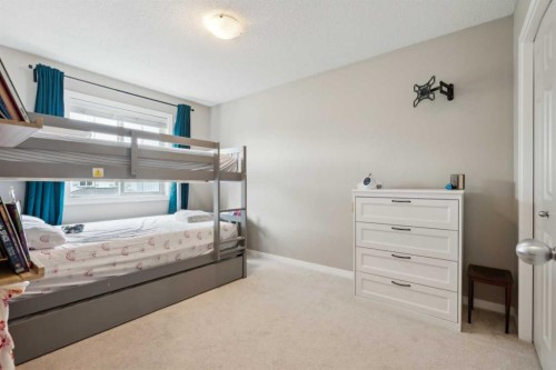 22 Nolanfield Heights Nw, Calgary, AB - Indoor Photo Showing Bedroom