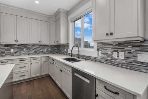 45 Rockcliff Heights Nw, Calgary, AB - Indoor Photo Showing Kitchen With Double Sink With Upgraded Kitchen