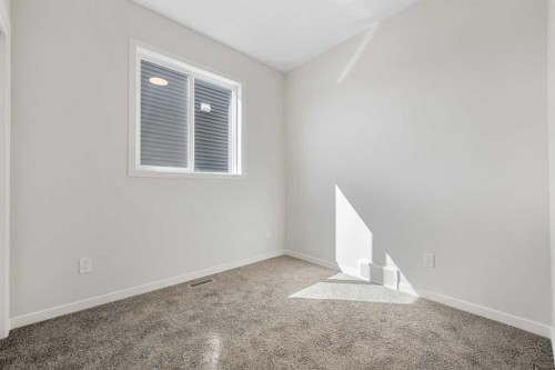 213 Bridgeport Gate, Chestermere, AB - Indoor Photo Showing Other Room