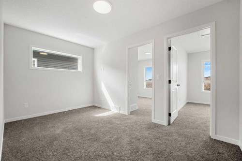 213 Bridgeport Gate, Chestermere, AB - Indoor Photo Showing Other Room