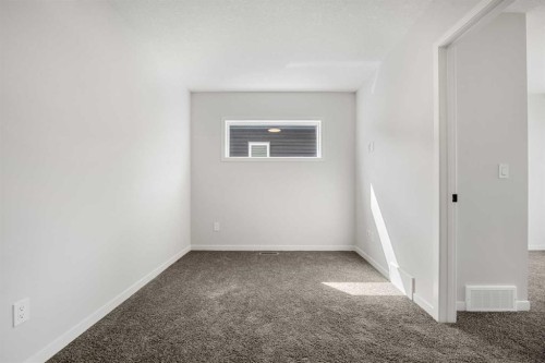 213 Bridgeport Gate, Chestermere, AB - Indoor Photo Showing Other Room