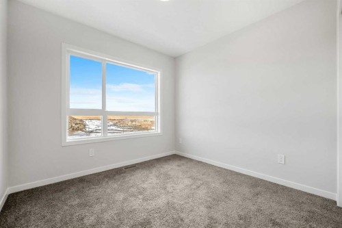 213 Bridgeport Gate, Chestermere, AB - Indoor Photo Showing Other Room