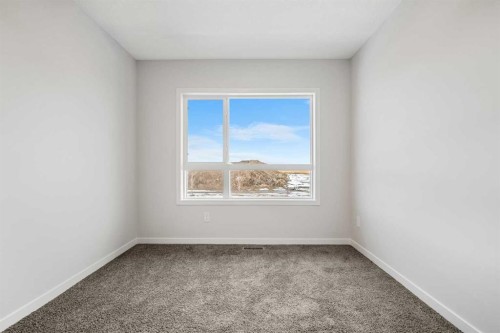 213 Bridgeport Gate, Chestermere, AB - Indoor Photo Showing Other Room