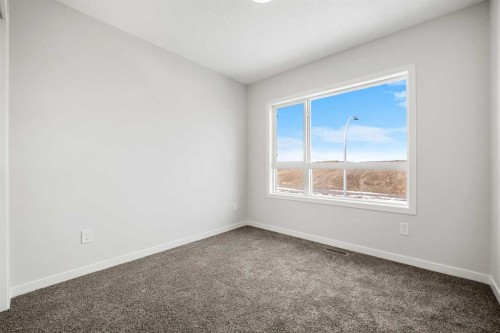213 Bridgeport Gate, Chestermere, AB - Indoor Photo Showing Other Room