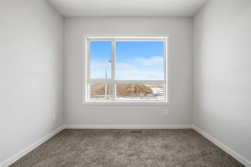 213 Bridgeport Gate, Chestermere, AB - Indoor Photo Showing Other Room