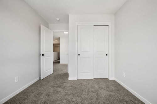213 Bridgeport Gate, Chestermere, AB - Indoor Photo Showing Other Room