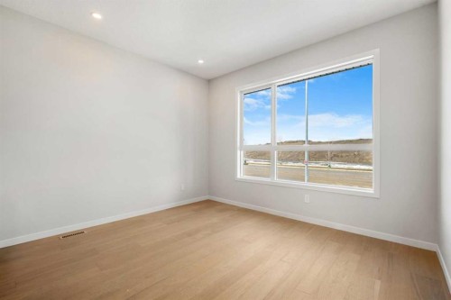 213 Bridgeport Gate, Chestermere, AB - Indoor Photo Showing Other Room