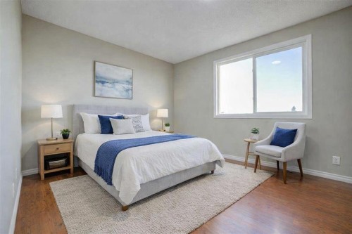 171 Erin Woods Drive Se, Calgary, AB - Indoor Photo Showing Bedroom