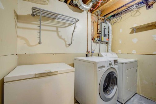 171 Erin Woods Drive Se, Calgary, AB - Indoor Photo Showing Laundry Room