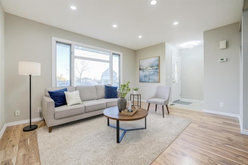 171 Erin Woods Drive Se, Calgary, AB - Indoor Photo Showing Living Room