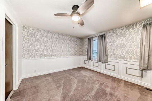 255 Falshire Way Ne, Calgary, AB - Indoor Photo Showing Other Room