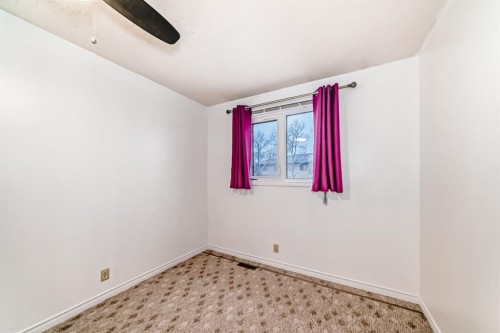 255 Falshire Way Ne, Calgary, AB - Indoor Photo Showing Other Room