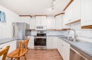 255 Falshire Way Ne, Calgary, AB  - Indoor Photo Showing Kitchen With Double Sink 