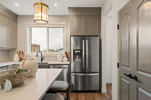 193 Silver Spruce Road Sw, Calgary, AB - Indoor Photo Showing Kitchen With Upgraded Kitchen