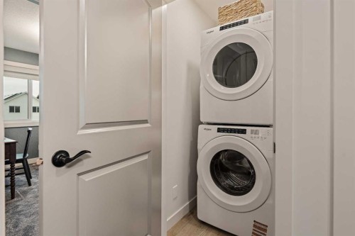 193 Silver Spruce Road Sw, Calgary, AB - Indoor Photo Showing Laundry Room