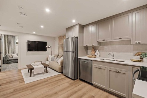 193 Silver Spruce Road Sw, Calgary, AB - Indoor Photo Showing Kitchen With Double Sink