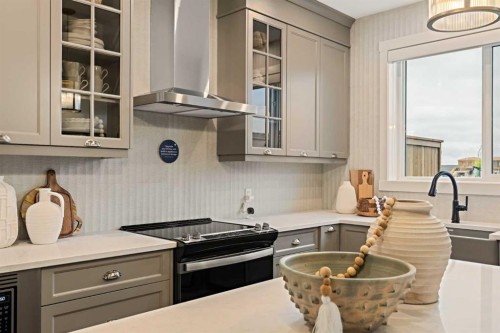 193 Silver Spruce Road Sw, Calgary, AB - Indoor Photo Showing Kitchen With Upgraded Kitchen