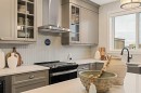 193 Silver Spruce Road Sw, Calgary, AB  - Indoor Photo Showing Kitchen With Upgraded Kitchen 