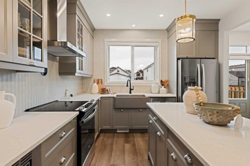 193 Silver Spruce Road Sw, Calgary, AB - Indoor Photo Showing Kitchen With Upgraded Kitchen