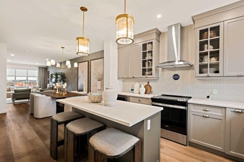 193 Silver Spruce Road Sw, Calgary, AB - Indoor Photo Showing Kitchen With Upgraded Kitchen