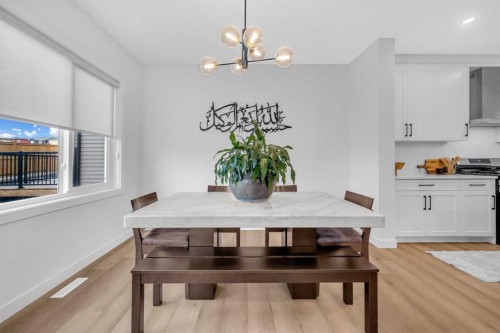 11 Heritage Circle, Cochrane, AB - Indoor Photo Showing Dining Room