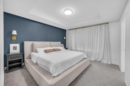 11 Heritage Circle, Cochrane, AB - Indoor Photo Showing Bedroom