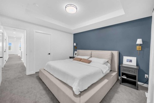 11 Heritage Circle, Cochrane, AB - Indoor Photo Showing Bedroom