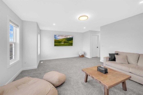 11 Heritage Circle, Cochrane, AB - Indoor Photo Showing Living Room