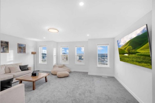 11 Heritage Circle, Cochrane, AB - Indoor Photo Showing Living Room
