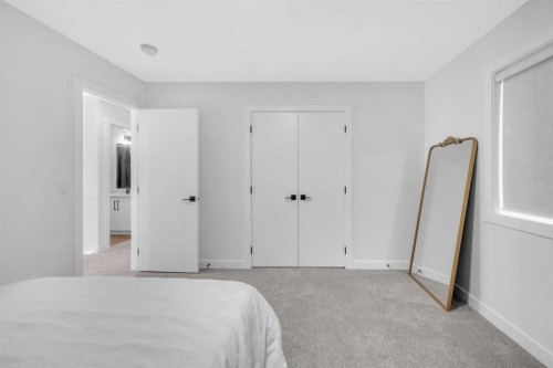 11 Heritage Circle, Cochrane, AB - Indoor Photo Showing Bedroom