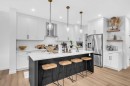 11 Heritage Circle, Cochrane, AB  - Indoor Photo Showing Kitchen With Upgraded Kitchen 