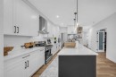 11 Heritage Circle, Cochrane, AB  - Indoor Photo Showing Kitchen With Upgraded Kitchen 