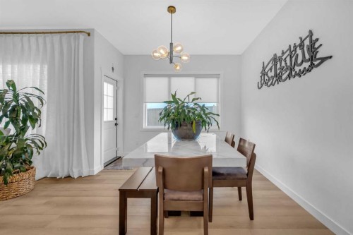 11 Heritage Circle, Cochrane, AB - Indoor Photo Showing Dining Room