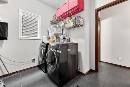 72 Auburn Bay Avenue Se, Calgary, AB - Indoor Photo Showing Laundry Room