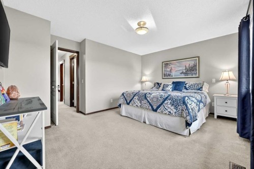 72 Auburn Bay Avenue Se, Calgary, AB - Indoor Photo Showing Bedroom