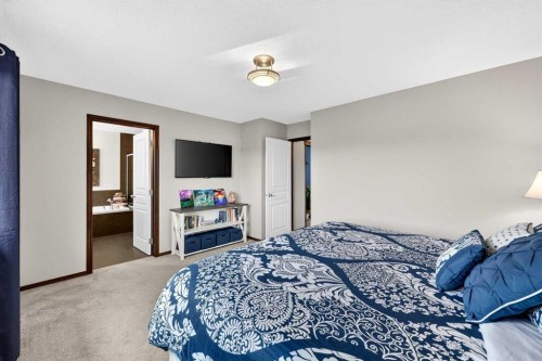 72 Auburn Bay Avenue Se, Calgary, AB - Indoor Photo Showing Bedroom