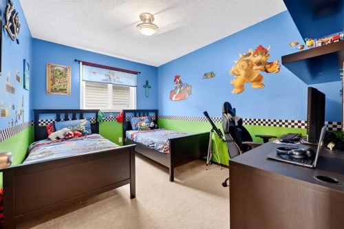72 Auburn Bay Avenue Se, Calgary, AB - Indoor Photo Showing Bedroom